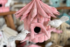 Pastel pink bird-house