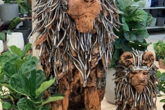 Silver-and-teak-lion-sculptures